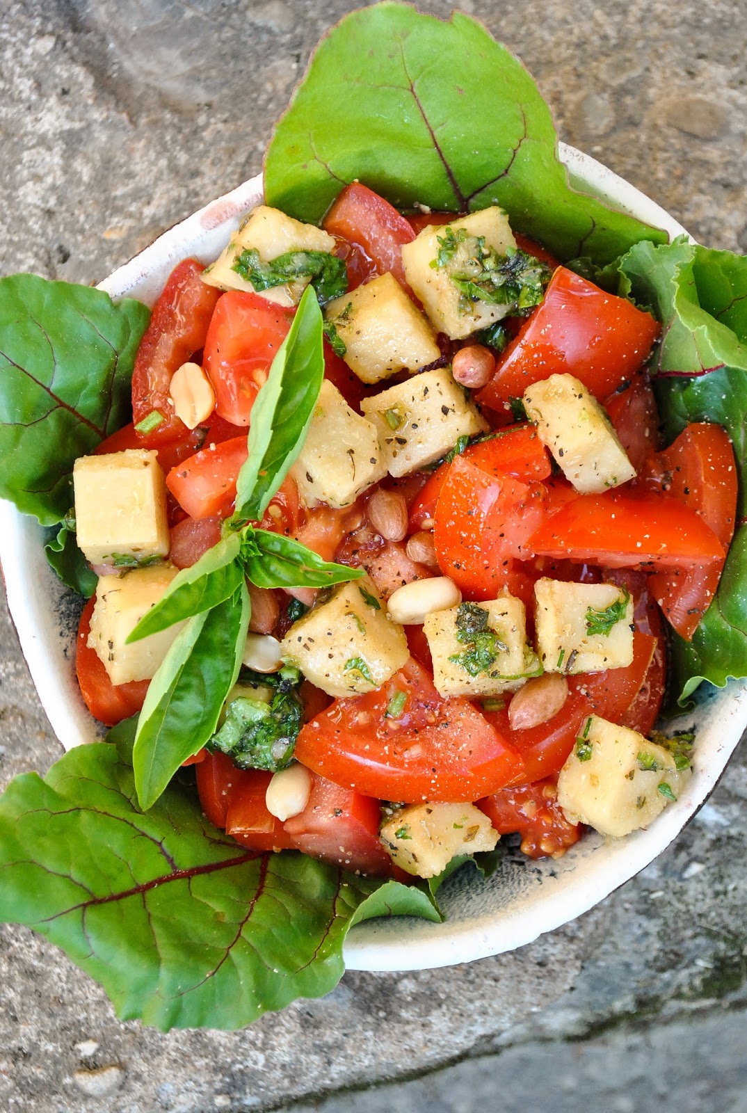 Homemade vegan cheese cubes in a herb marinade VeganSandra
