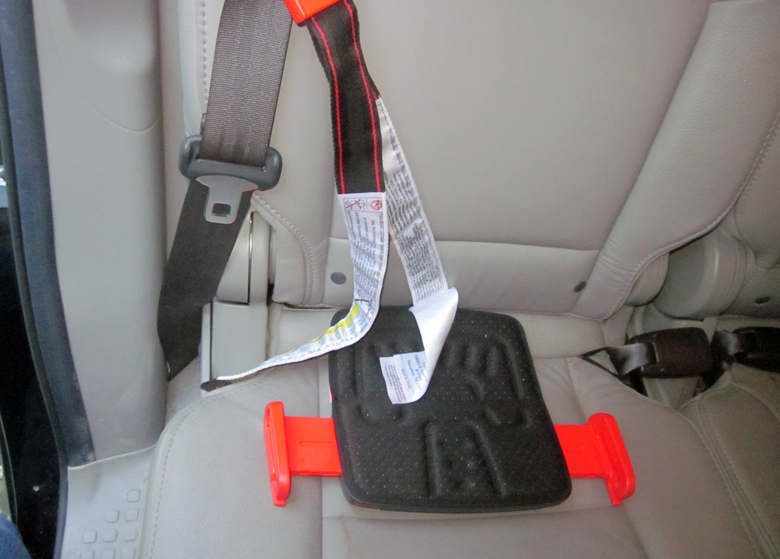 Buckle Up, Buttercup! The Mifold a unique booster seat