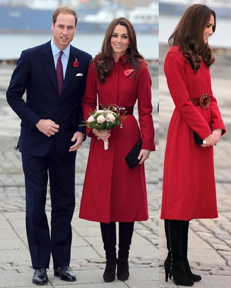 Kate Middleton wears a poppy-red LK Bennett coat. The Duke and Duchess of Cambridge were both already wearing their poppy pins