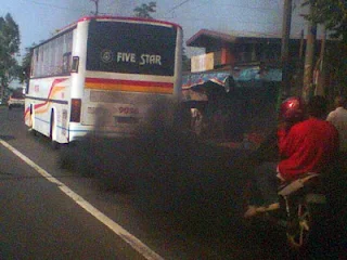 Air pollution in the Philippines. Air polluting bus in the Philippines