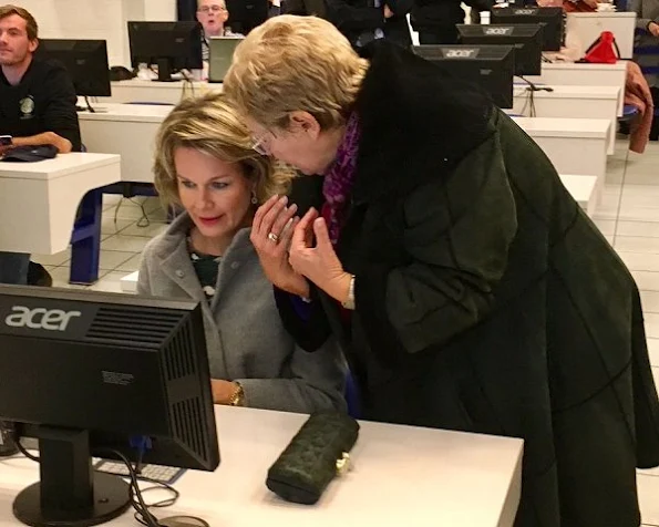 Queen Mathilde wore Natan dress, Natan coat, Natan shoes, Tikli Jewelry earrings, Delphine Nardin Gold Earrings, Diane von Furstenberg clutch