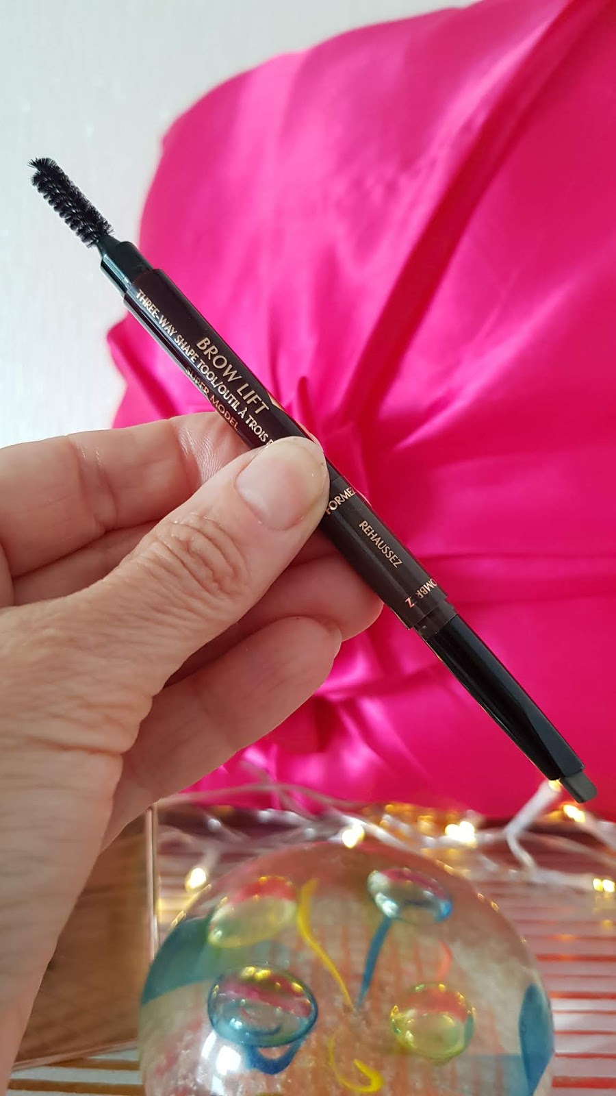 A great tool for shaping and highlighting the brows:  Charlotte Tilbury Brow Lift 