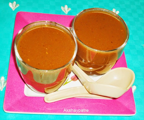 carrot tomato soup in serving bowl
