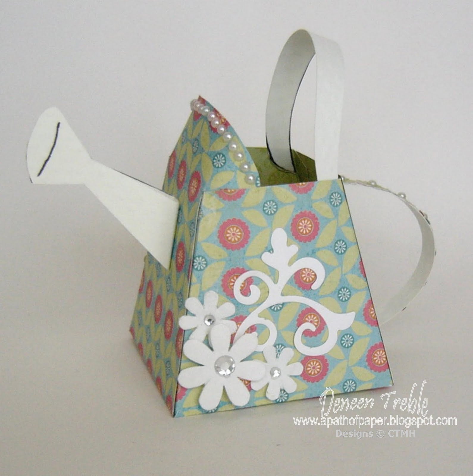 A Path of Paper Watering Cans