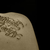 Cool Tattoos Letter Designs / 3 / Unique s tattoo on the leg: