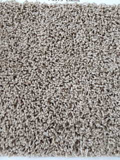 An image of grey carpet