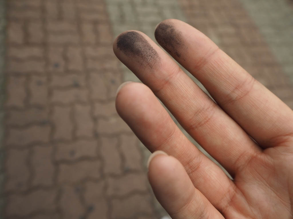 Coal dust on fingers from third infiltration tunnel at DMZ South Korea