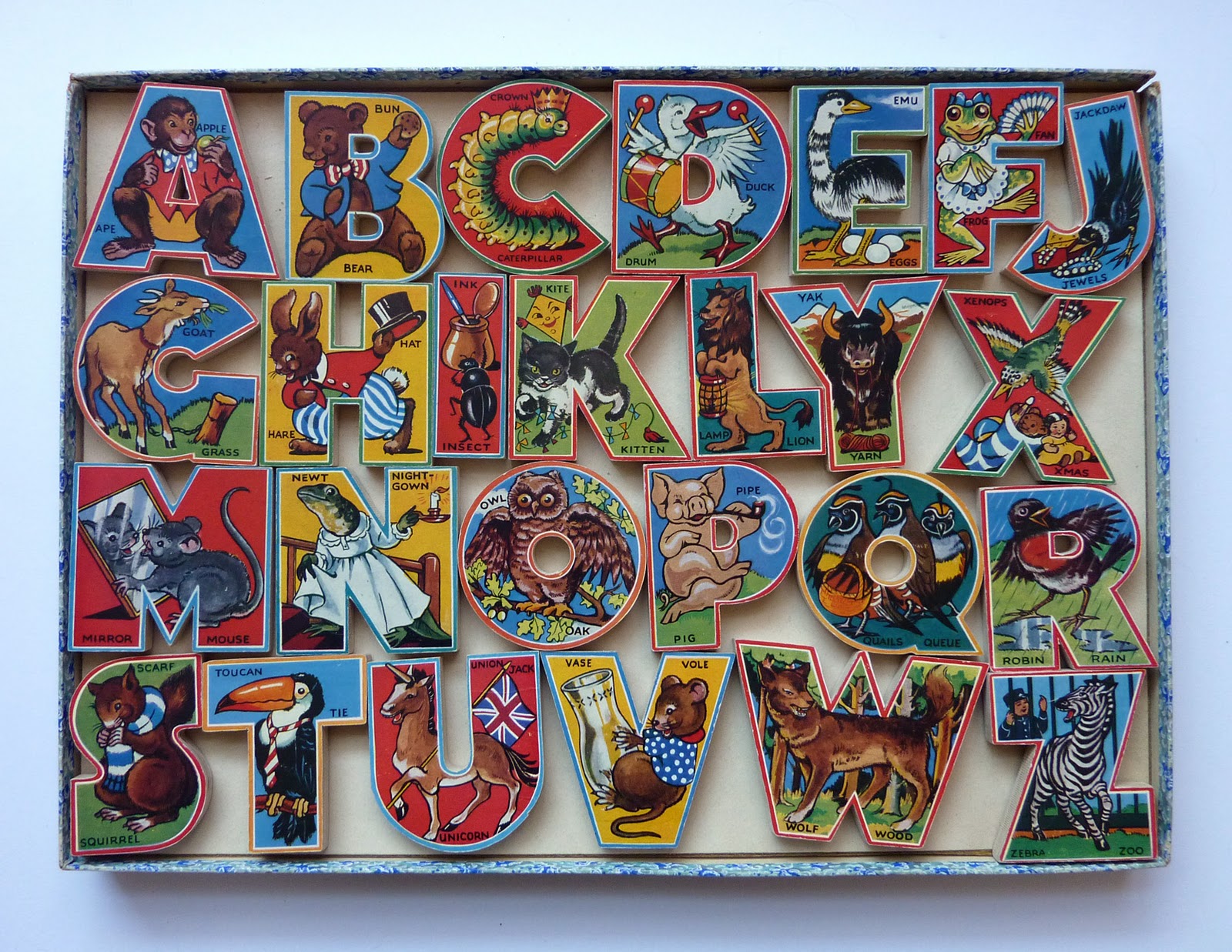 turning pages Vintage animal alphabet