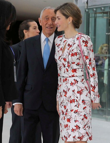 Uterque bag, Queen Letizia wore Zara wool coat in red, Carolina Herrera Floral Dress and Lodi Saray Pumps at European Conference in Porto