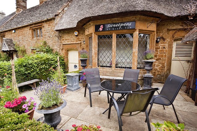 Outside seating at the Cafe in Great Tew in the Cotswolds by  Martyn Ferry Photography