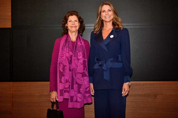 Princess Madeleine wore Diane von Furstenberg stassie satin crepe jacket and ciara satin crepe pants. Manolo Blahnik pumps