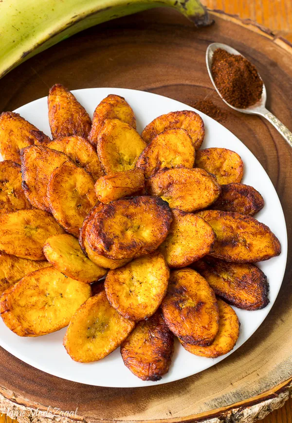 A plate of spicy fried plantains