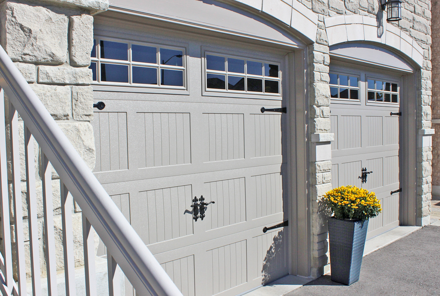CHI Carriage House Garage Doors Sandstone Wrought Iron 
