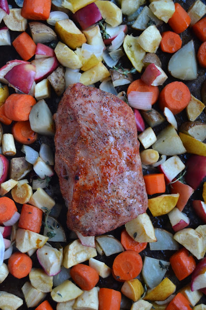 Roasted Pork, Apples and Root Vegetables- a simple dish loaded with sweet apples and savory root vegetables alongside a sweet spice-rubbed roasted pork!
