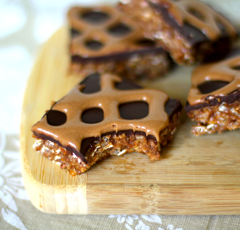 These Healthy Peanut Butter and Chocolate Krispy Treats are rich, sweet, crunchy, and chewy.  They sure don't taste refined sugar free, high protein, and gluten free in the slightest!