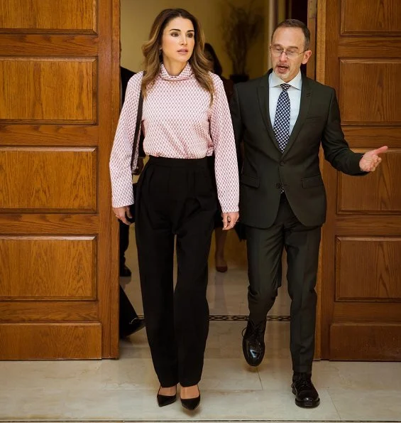 King Hussein Bin Talal Convention Center in Dead Sea in Jordan. Queen Rania wore Fendi pink dot blouse