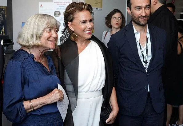 The Duke and Duchess attended French Film Festival and met Catherine Deneuve. floral print jacket