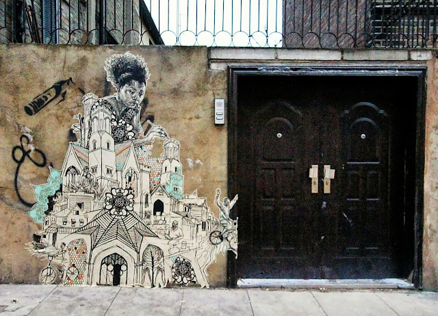 Street Art By American Artist Swoon On the streets of East London, UK.