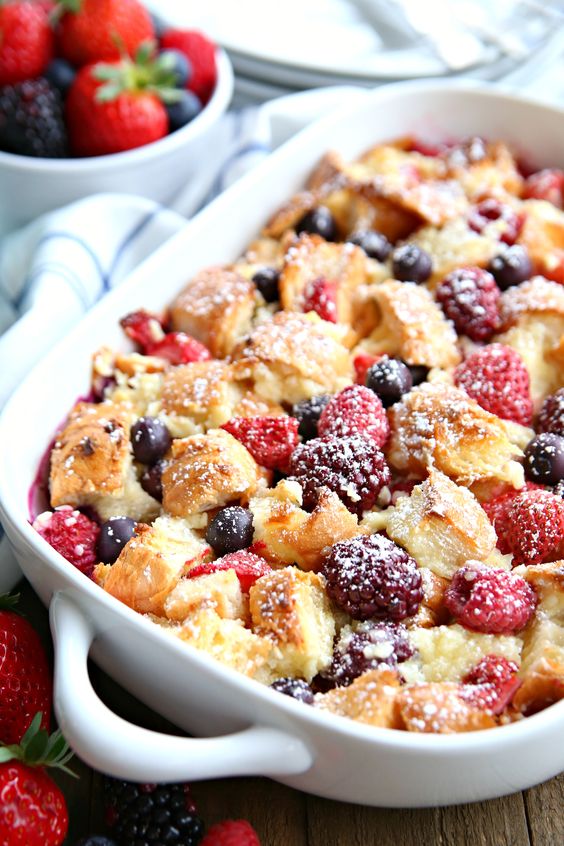 This Berry Croissant Bake combines buttery croissants, cream cheese, eggs, and berries to create the most delicious breakfast bake. Prepare it the night before and just pop it in the oven for an easy overnight breakfast dish everyone will love!
