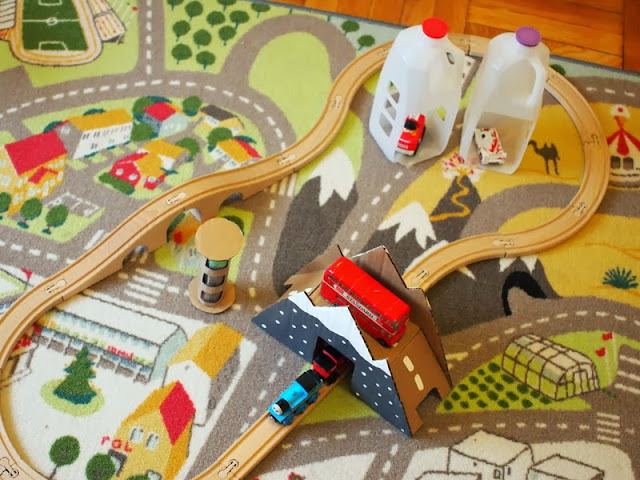 DIY toy cardboard bridge used during play