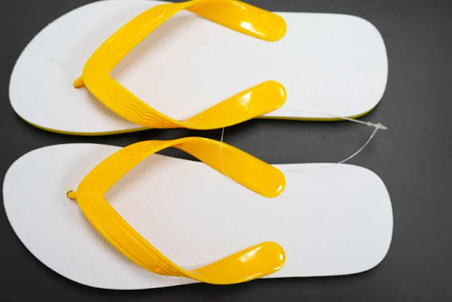 yellow flip-flops tied together