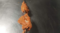 Marinated chicken pieces in Shewer for Tandoori chicken recipe
