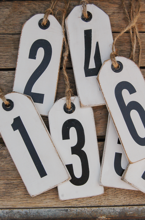Plywood scraps turned distressed number tags