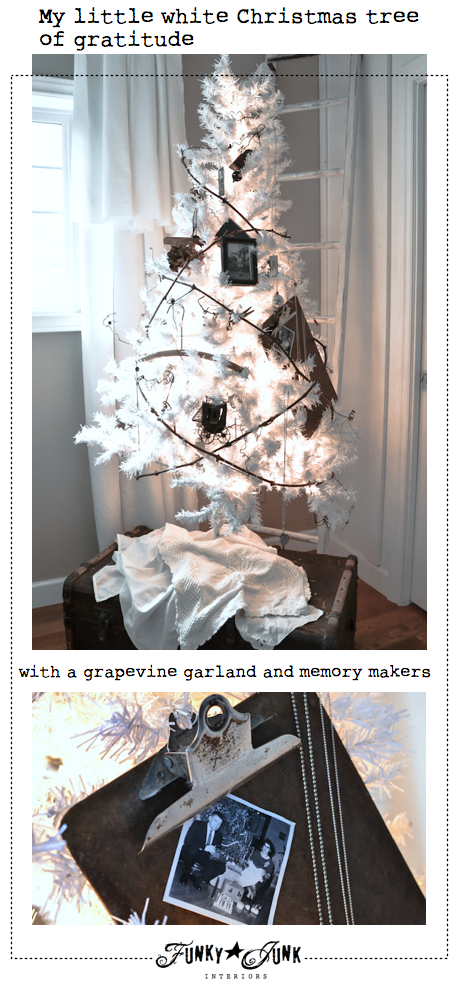 A little white Christmas tree of gratitude, complete with memory makers and a grapevine garland via Funky Junk Interiors
