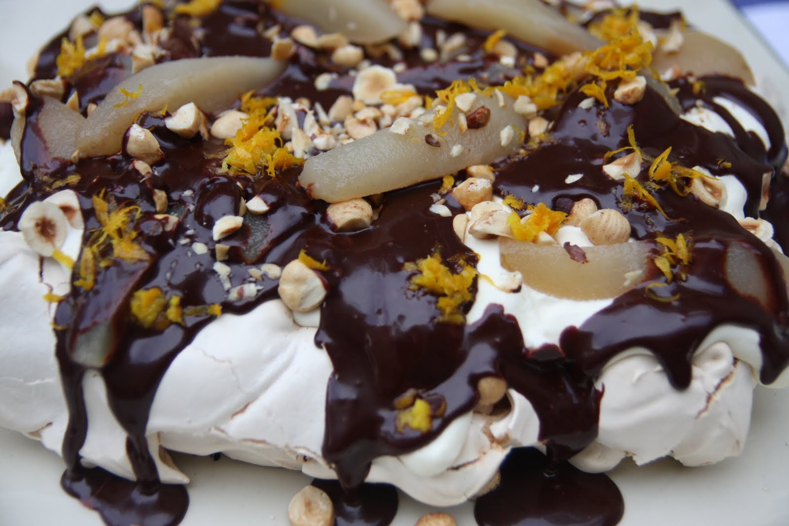 PAOLO'S PLATE Meringue with Poached Pears, Cream, Toasted Hazelnuts