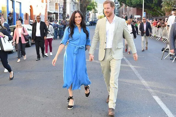 Meghan Markle wore Veronica Beard Sky Blue Cara dress. Duchess is in the same dress she wore on tour in Tonga