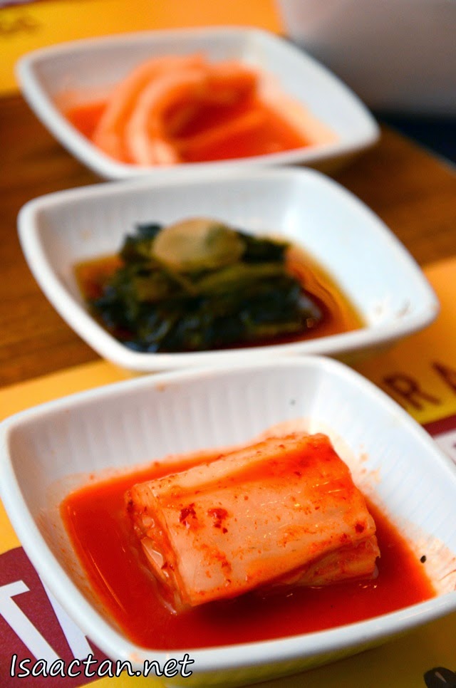 Three of the six side dishes that come with every order at Bulgogi Brothers