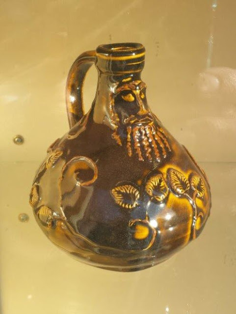 Ceramic Bartmann (Bellarmine) jug in Amber Celadon by Lily L.