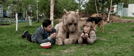 Russian Couple Adopted An Orphaned Bear 23 Years Ago, And They Still Live Together - The bear eats 25kg of fish, vegetables and eggs every day!