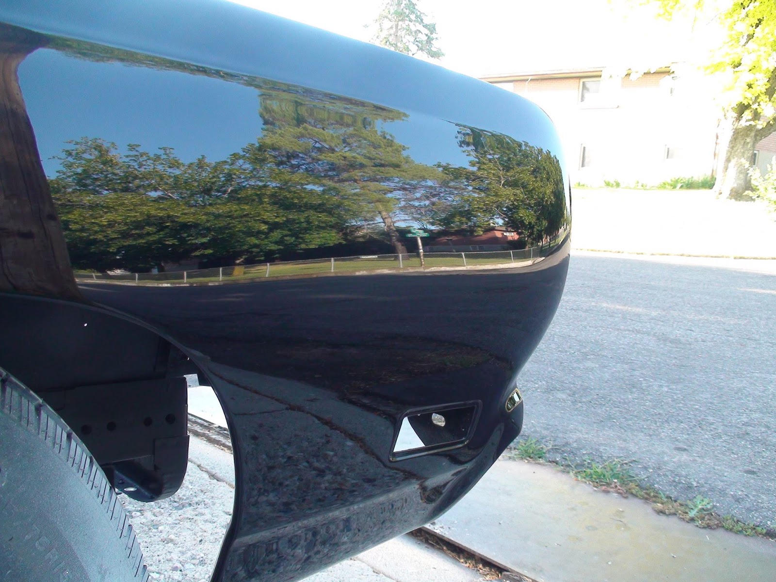 Just A Car Guy an example of perfect paint, perfect BLACK paint. If