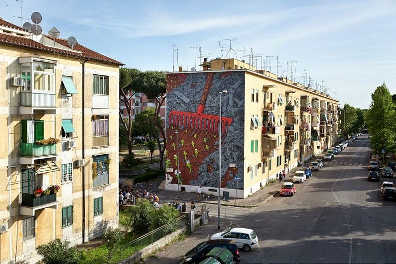 Spanish street artist Liquen just finished his first mural for the Sanba festival on the streets of San Basilio, Italy.