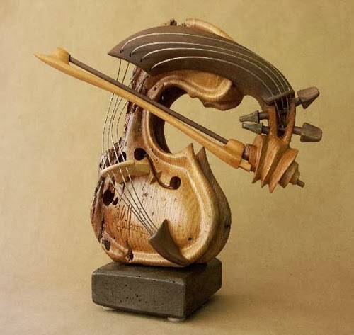 12-Self-Taught-Philippe-Guillerm-Musical-Instruments-Sculptures-French-Artist-Musician-Sculptor-Painter-Furniture-Maker-www-designstack-co