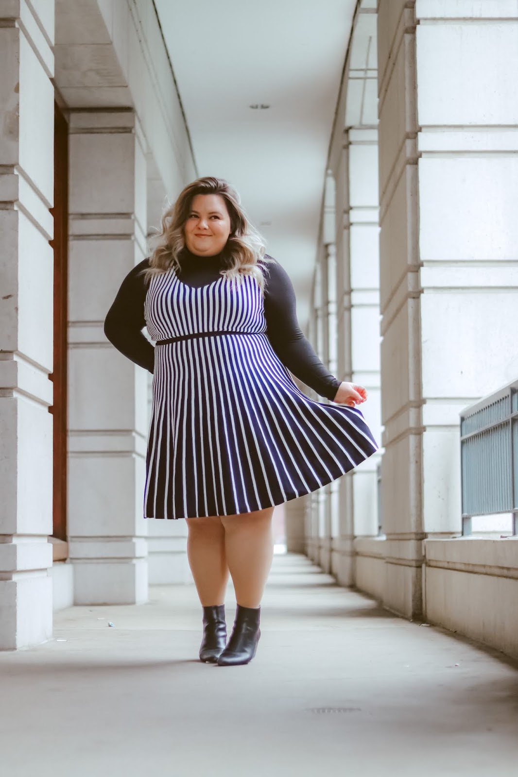 Chicago Plus Size Petite Fashion Blogger Natalie in the City styles Torrid's flattering Black & White Stripe Sweater-Knit Skater Dress.