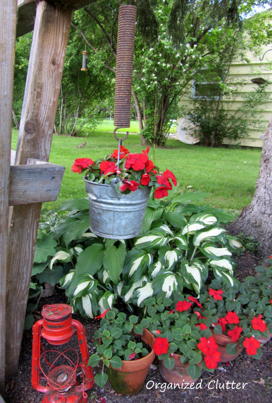 Two Easy Flower Pot Hangers For The Junk Garden - Organized Clutter