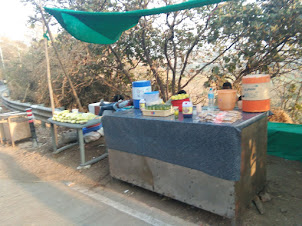 Food and cold drink stalls at entrance to Shivneri Fort .