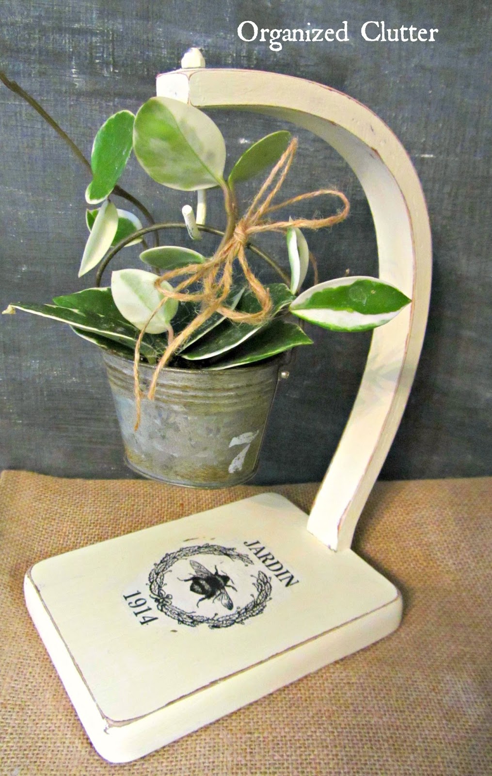 Wax Plant Displayed on Upcycled Banana Stand www.organizedclutterqueen.blogspot.com