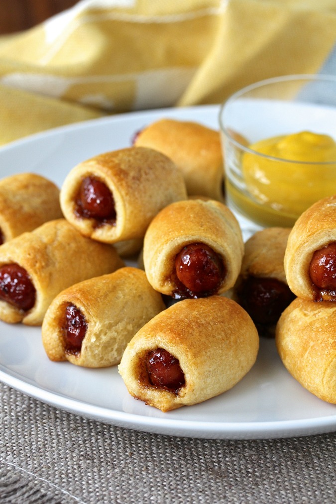 These Spicy Pigs in a Blanket take me back to the days when I was first learning to cook. It's a great recipe for game day, and these are ridiculously easy to make.