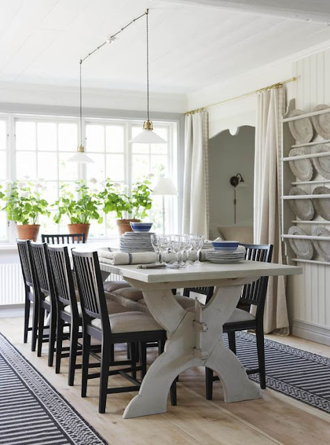 Scandinavian style dining room with Swedish chairs - found on Hello Lovely Studio