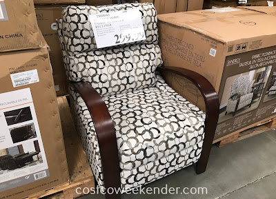 Relax after a long day at work on the Synergy Fabric Pushback Recliner