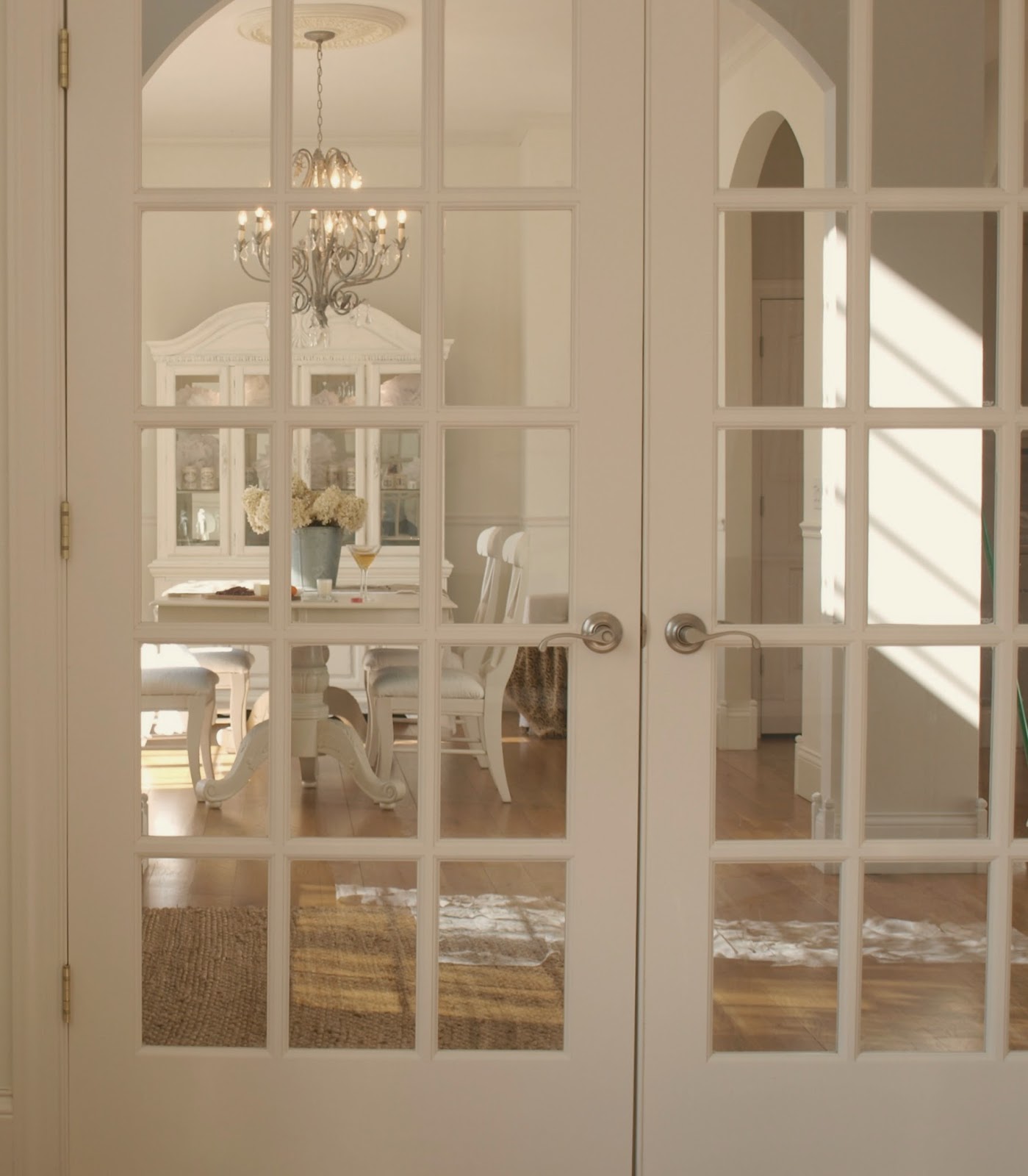 Hello Lovely Studio white French doors to dining room