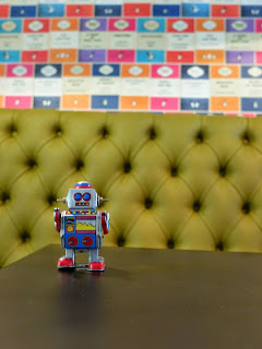 A toy robot in a pub