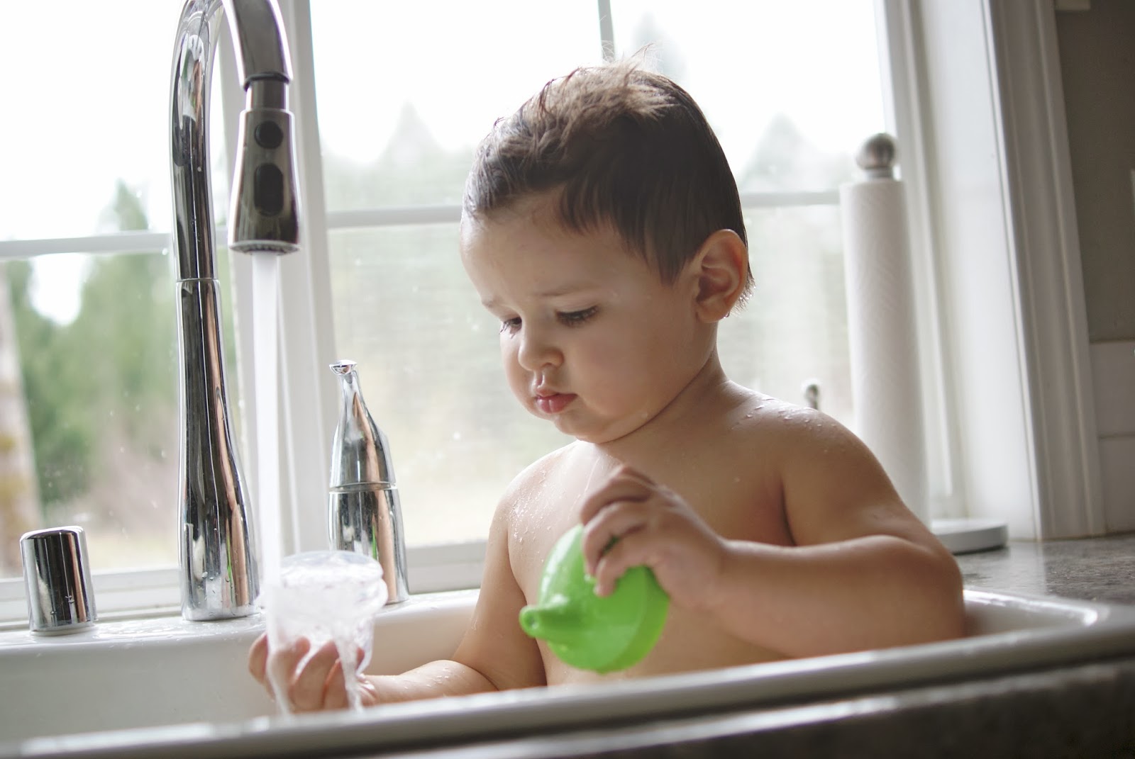 Three Men & One Lady. Sink Bath for a Sick Baby.