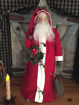 Standing Santa In Red Suit With Sled