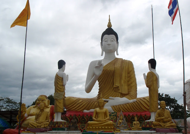 Sitting & standing buddha's at to the Wat Pha Po Paan Kam in Khon Kaen, Thailand