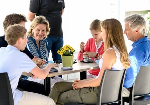 Queen Mathilde, Crown Princess Elisabeth, Prince Gabriel, Princess Eleonore and Prince Emmanuel. Etro blue embroidered blouse, Zara top