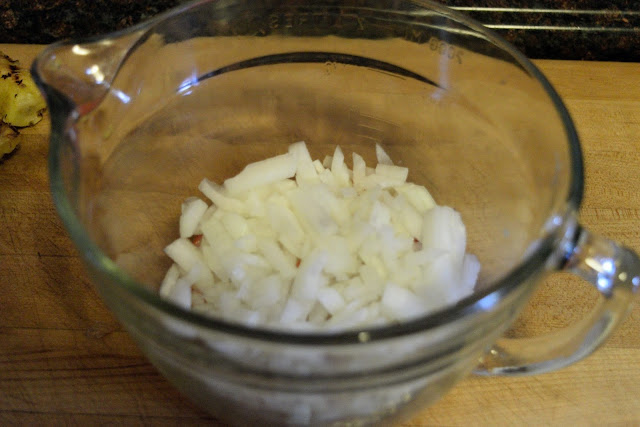 Diced onions in a mixing bowl. 